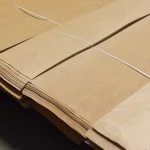 Packed bundles of sliced beech veneer 2.1-3.8 m long on a pallet.