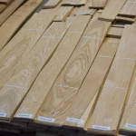 Detailed texture of natural oak veneer grade 2 with marking.