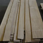 Laid out sheets of sliced oak veneer, 2.1-3.8 m long, on a pallet.