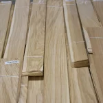 Sheets of natural sliced oak veneer with distinct wood grain
