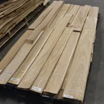 Pallet with packs of sliced oak veneer 3rd grade at the WoodWay Expert warehouse