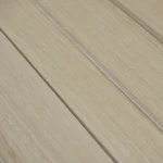 Macro photo of natural sliced oak veneer texture at an angle