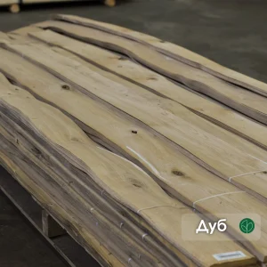 Natural sliced oak veneer sheets with knots 0.6 mm thick in packs on pallet