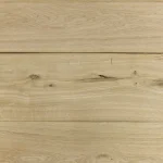 Detailed surface texture of sawn oak veneer with prominent knots