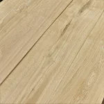 Sheets of natural sliced oak veneer at an angle showing wood grain