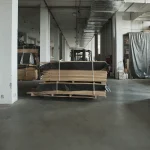 Warehouse of sawn oak veneer and other lumber at WoodWay Expert with a forklift