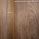 Texture and grain pattern of natural sliced American walnut veneer