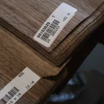 Barcode labels and edge of the sliced American walnut veneer bundle