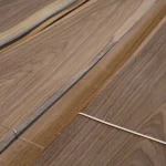 Detailed view of the joint and fibers of natural American walnut veneer