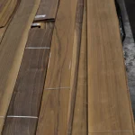 Texture and grain of natural sliced American walnut veneer, grade 1.