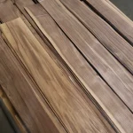 Sheets of natural sliced American Walnut veneer laid out in the warehouse