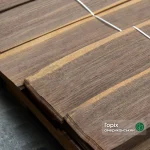 A bundle of natural sliced American walnut veneer 0.6 mm thick in the warehouse
