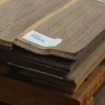 Ends of a sliced American walnut veneer bundle 0.6 mm thick with marking