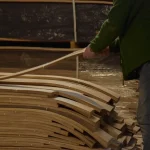 Selection and sorting process of natural sliced American Walnut veneer in the warehouse.