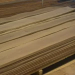 Stack of sliced European Walnut veneer packs, extra grade, on a pallet