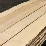 Stack of natural sliced maple veneer sheets of the first grade.