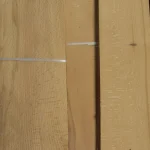 Texture of natural sliced beech veneer showing characteristic grain pattern