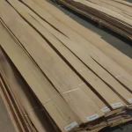 Bundles of sliced beech veneer over 2.8 m long stacked in a warehouse