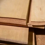 Edges of sliced beech veneer sheets showing 1.5 mm thickness