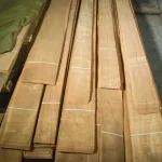 Bundles of natural sliced cherry veneer with lengths from 0.8 to 2.05 meters in stock.