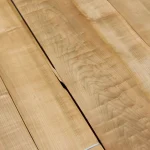 Sheets of sliced cherry veneer grade 1 with a distinct natural wood pattern.