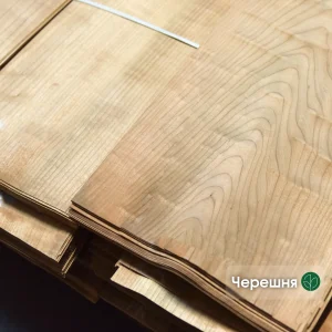 Natural sliced European cherry veneer 0.6 mm thick with beautiful wood grain pattern.
