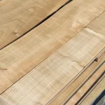 Detailed view of the surface of natural sliced European cherry veneer.