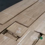 Pack of natural sliced oak veneer 1.5 mm thick, first grade, at the warehouse.