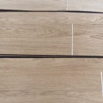 Wood grain texture of natural sliced oak veneer sheets, 1.5 mm thick.