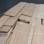 Stack of sliced oak veneer packs, 1.5 mm thick, at the lumber warehouse.
