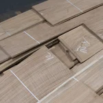 Several packs of 1.5 mm thick sliced oak veneer on a pallet.