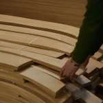 Process of selecting and sorting sliced oak veneer in production.