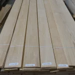 Bundles of sliced oak veneer with barcode labels