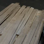 Warehouse pallet with bundles of natural sliced oak veneer