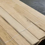 Bundle of natural sliced oak veneer 2.5 mm secured with plastic straps.