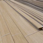 Long sheets of sawn oak veneer grade I in the warehouse.