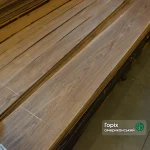 A pack of natural sliced American walnut veneer 0.6 mm thick at the WoodWay Expert warehouse.