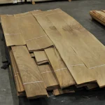 Pallet with stacks of sliced European Walnut veneer in the warehouse.