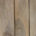 Wavy grain pattern on a sheet of sliced European walnut veneer.