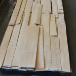 Large volume of sliced alder veneer bundles at the WoodWay Expert warehouse.