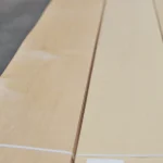 Texture and smooth surface of natural sliced alder veneer close-up