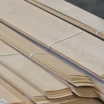 Stack of bundles of natural sliced alder veneer 0.5-0.75 m long
