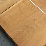 Wood grain texture of natural sliced American cherry veneer