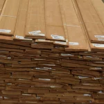 Warehouse pallet with bundles of sliced American cherry veneer and barcodes