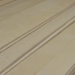 Edges of sliced white ash veneer pack showing 0.6 mm thickness