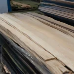 Pallet with stacks of sliced white ash veneer ranging from 2.1 to 3.8 m in length