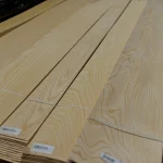 Sliced white ash veneer sheets 1.5 mm prepared for sale.
