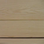 Texture of natural sliced white ash veneer with a prominent wood grain pattern.