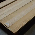 Beautiful texture and grain pattern on the surface of sliced white ash veneer.