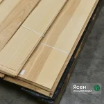 A pack of natural sliced olive ash veneer 1.5 mm thick on a pallet